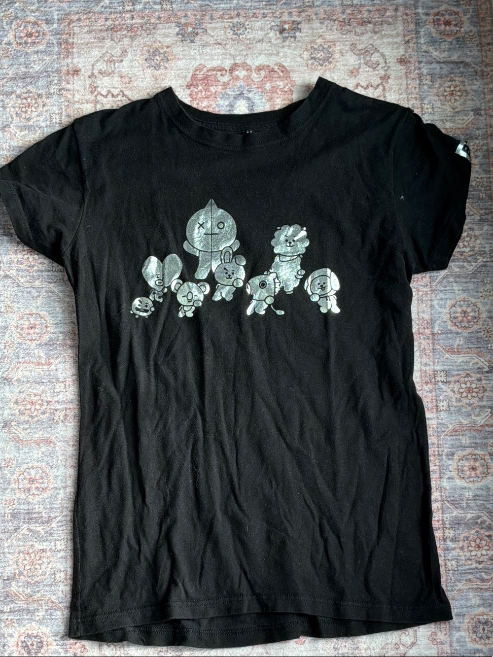 Black Short-Sleeve Graphic Tee with Silver Character Print